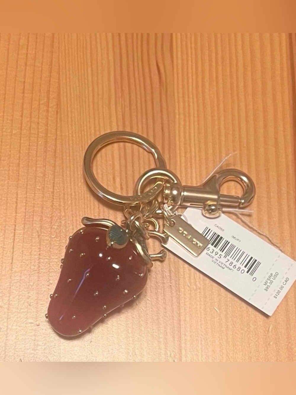 Coach Gold-Tone Keychain with Red Strawberry Charm